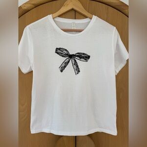 White Short Sleeve NWOT Tee with Black Lace Bow Size L